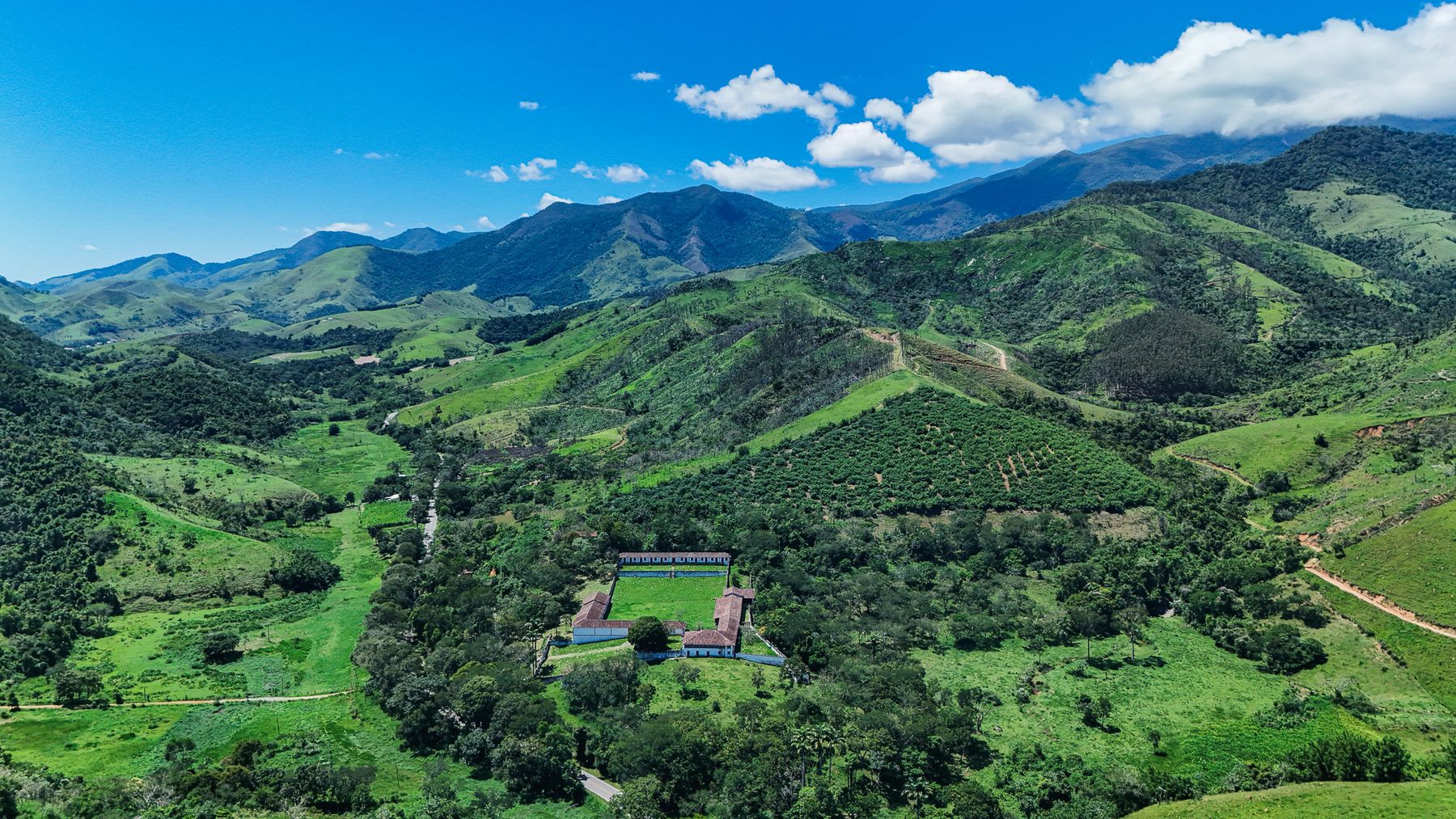 Green valley between mountains, drone view, Brazil