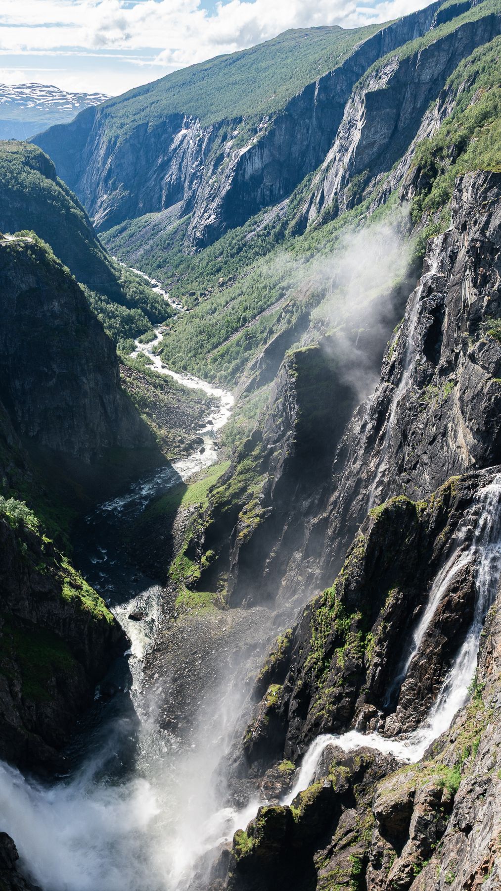 Waterfall in a narrow Norwegian valley